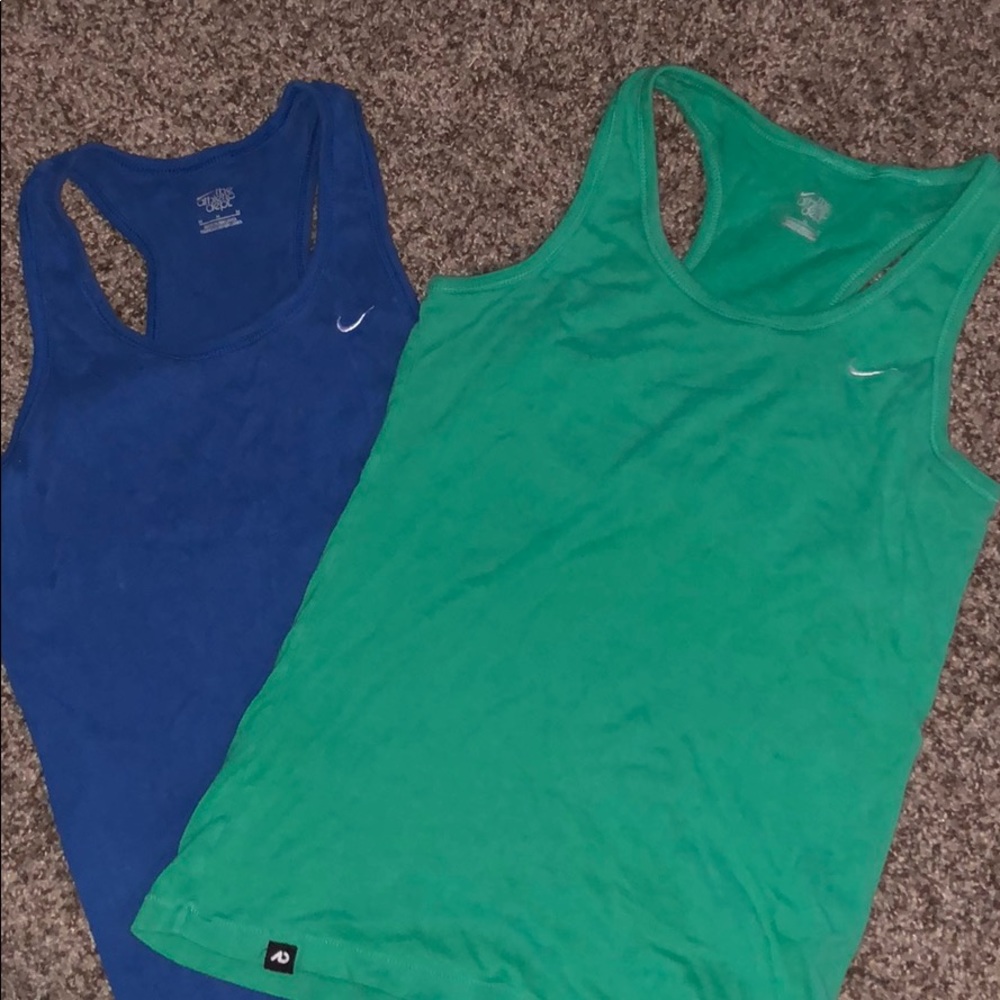 2 nike tank tops w/built in bra